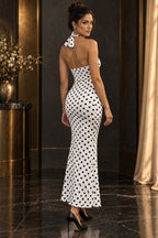 Robe blanche à pois noirs vue de dos trois-quarts