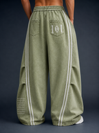 Green white pleated/flared women's trousers - DIFFERENT