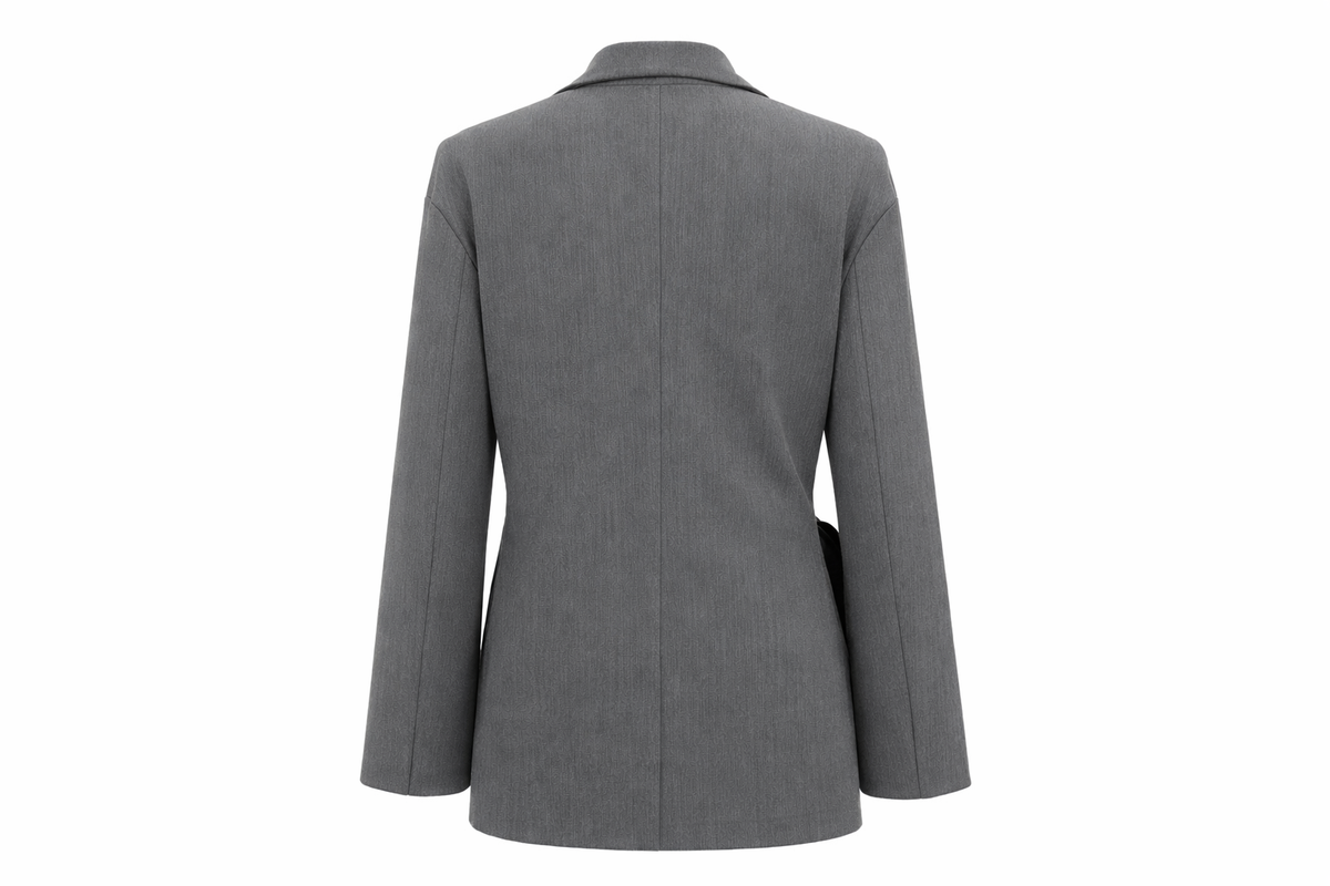 Flat lay dos studio Blazer cintré gris studio fond blanc édition limitée DIFFÉRENT