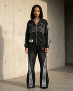 Black HN jogging set worn by a woman, hood up, Hype Or Nothing zip-up hoodie and flared striped trousers – DIFFERENT Paris