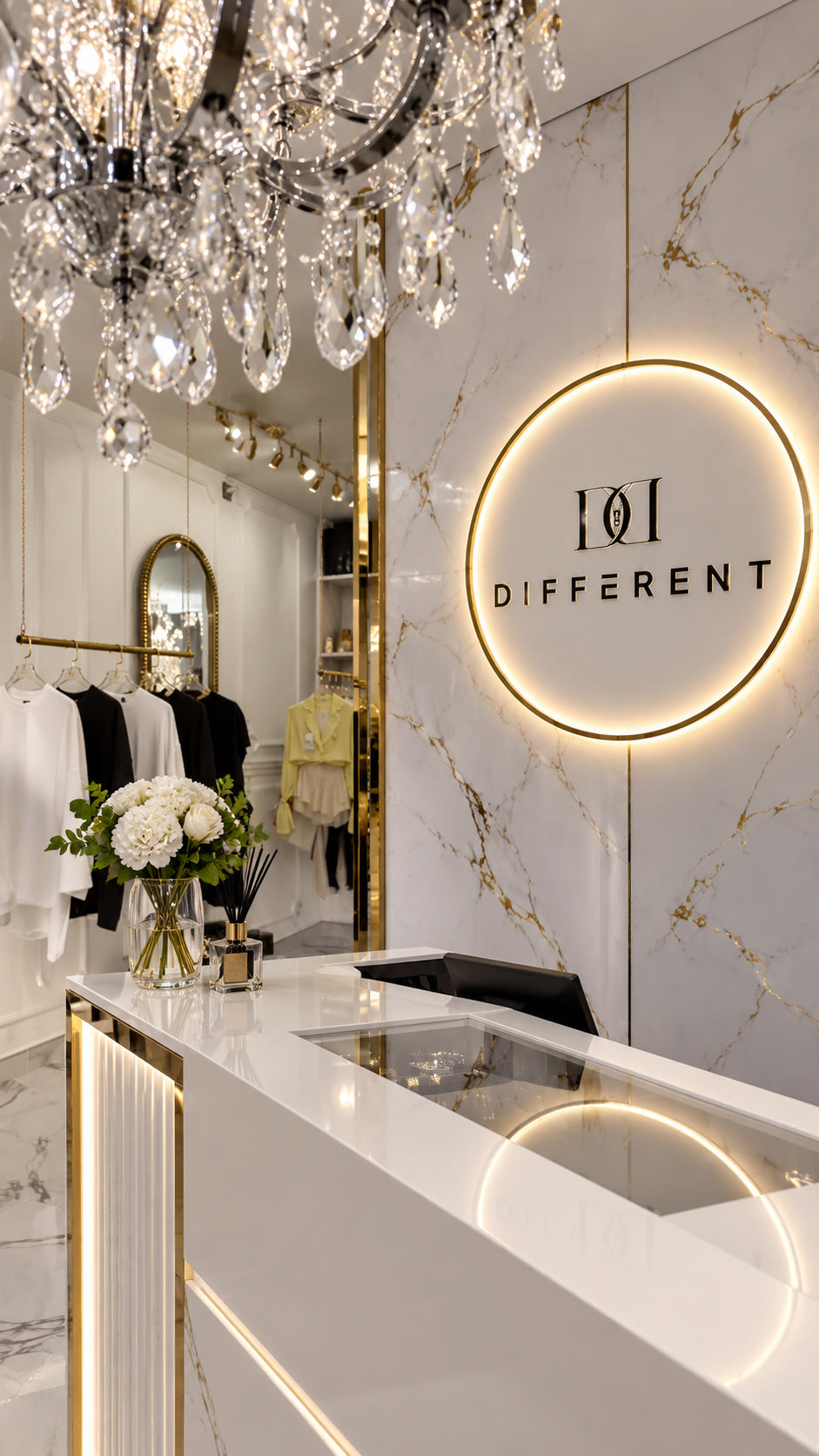 Comptoir et logo lumineux DIFFERENT sous un lustre en cristal, boutique streetwear rue Ramponeau à Belleville