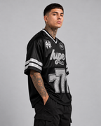 Maillot oversize Hype 777 porté, vue de profil – DIFFERENT Paris